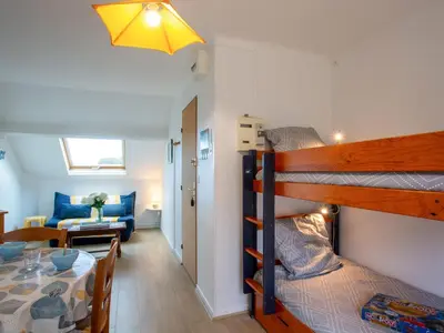 Un ou plusieurs lits dans un hébergement de l'établissement Apartment Les Tilleuls-1 by Interhome