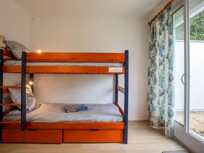 Un ou plusieurs lits dans un hébergement de l'établissement Apartment Les Tilleuls-1 by Interhome