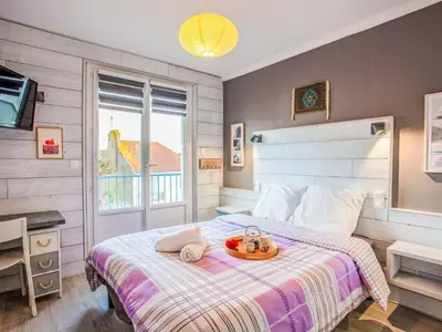 Un ou plusieurs lits dans un hébergement de l'établissement Apartment Les Tilleuls-2 by Interhome