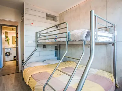 Un ou plusieurs lits dans un hébergement de l'établissement Apartment Les Tilleuls-2 by Interhome