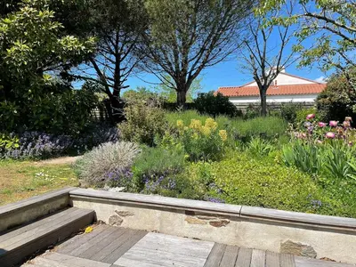 Jardin de l'établissement Jolie maison au calme entre Nantes et la mer