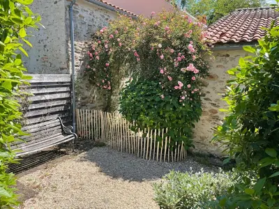 Jardin de l'établissement Jolie maison au calme entre Nantes et la mer