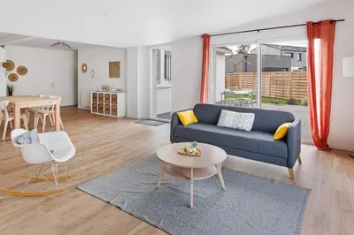 Coin salon dans l'établissement La Catinou - Maison confortable et spacieuse