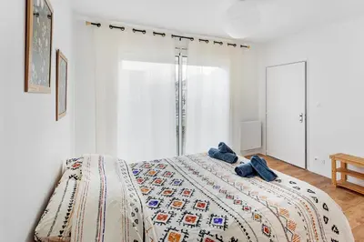 Un ou plusieurs lits dans un hébergement de l'établissement La Catinou - Maison confortable et spacieuse