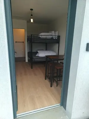 Un ou plusieurs lits dans un hébergement de l'établissement Studio 2 à 4 personnes, 12 kilomètres du parc du Puy du F