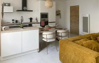 Cuisine ou kitchenette dans l'établissement Jolie Maison