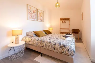 Un ou plusieurs lits dans un hébergement de l'établissement La Coquette - Charmante Maison de Sucé-sur-Erdre