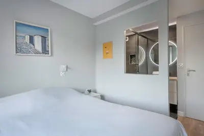 Un ou plusieurs lits dans un hébergement de l'établissement La Baule, appartement confortable pour 4
