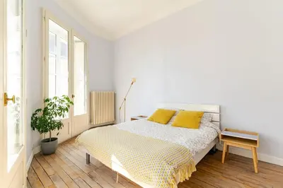 Un ou plusieurs lits dans un hébergement de l'établissement Appartement cosy hypercentre T3 Graslin