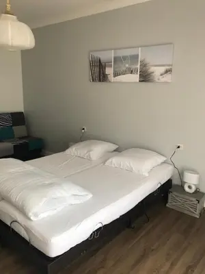 Un ou plusieurs lits dans un hébergement de l'établissement Maison de famille de 150 m2 à 15 minutes de la mer