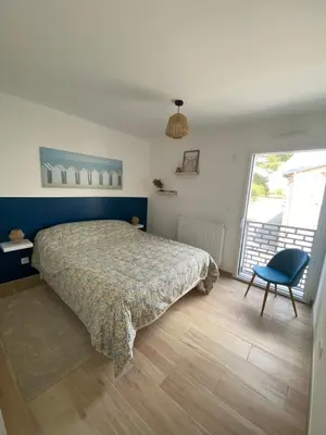 Un ou plusieurs lits dans un hébergement de l'établissement Appartement cosy à 100m de la plage