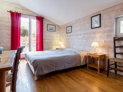 Un ou plusieurs lits dans un hébergement de l'établissement Maison éco près de la mer avec jardin et wifi - FR-1-306-1291