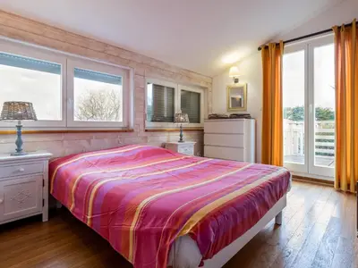 Un ou plusieurs lits dans un hébergement de l'établissement Maison éco près de la mer avec jardin et wifi - FR-1-306-1291