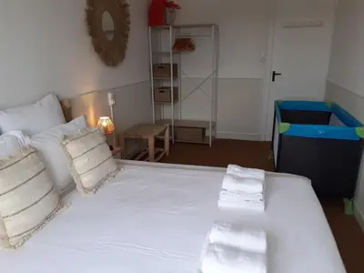 Un ou plusieurs lits dans un hébergement de l'établissement Appartement face mer Rêve de Flo ts