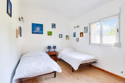 Un ou plusieurs lits dans un hébergement de l'établissement Face à l'océan, belle maison spacieuse pour 6