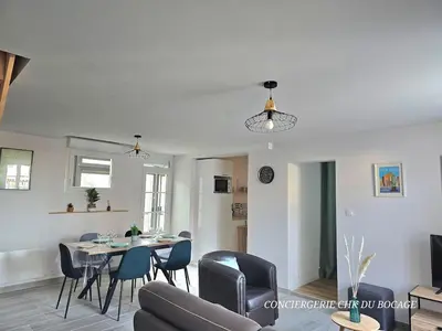 Coin salon dans l'établissement Le Relais 19 centre bourg T4 100m2 - 4min à Puy duFou