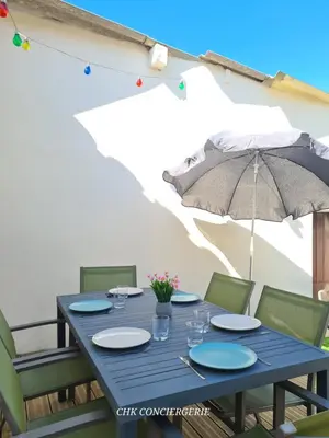 Terrasse ou espace extérieur de l'établissement Le Relais 19 centre bourg T4 100m2 - 4min à Puy duFou