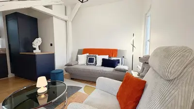 Coin salon dans l'établissement Coup de Coeur Angevin - Hypercentre - Calme - Cozy