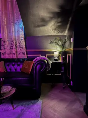 Coin salon dans l'établissement Le Glam Divin