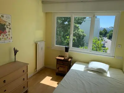 Un ou plusieurs lits dans un hébergement de l'établissement Appartement nantais 4 chambres