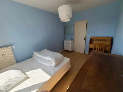 Un ou plusieurs lits dans un hébergement de l'établissement Appartement nantais 4 chambres