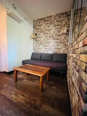 Coin salon dans l'établissement Comfy Loft - Dalby