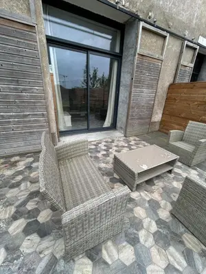 Coin salon dans l'établissement chambre meublée Nantaise dans un T3 commun avec terrasse
