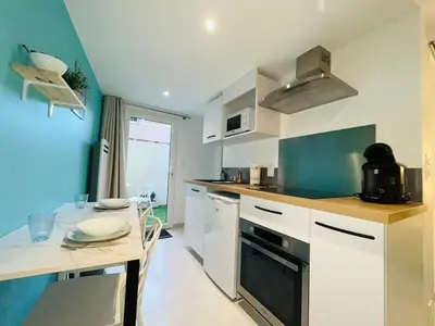 Cuisine ou kitchenette dans l'établissement Le Lys Bleu
