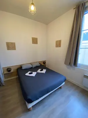 Un ou plusieurs lits dans un hébergement de l'établissement Charmant T2 - Centre - 4 personnes