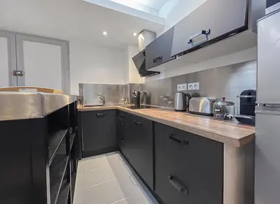 Cuisine ou kitchenette dans l'établissement T2 Spacieux & Lumineux Hyper Centre