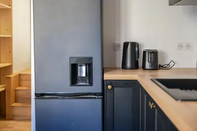 Cuisine ou kitchenette dans l'établissement charmant appartement coeur de ville 4 personnes