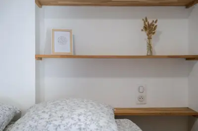 Un ou plusieurs lits dans un hébergement de l'établissement charmant appartement coeur de ville 4 personnes