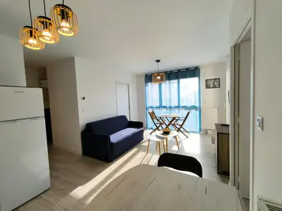 Un ou plusieurs lits dans un hébergement de l'établissement Appartement avec terrasse vue mer, hypercentre de Saint Brevin l'Ocean, 1 chambre