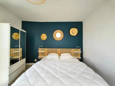 Un ou plusieurs lits dans un hébergement de l'établissement Appartement avec terrasse vue mer, hypercentre de Saint Brevin l'Ocean, 1 chambre