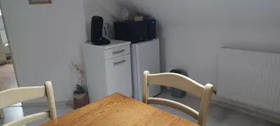 Télévision ou salle de divertissement dans l'établissement Chambre reposante