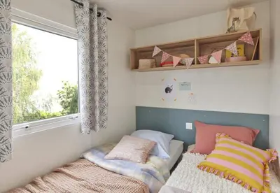 Un ou plusieurs lits dans un hébergement de l'établissement Camping du Lac de Pouzauges à 15' du PuyduFou