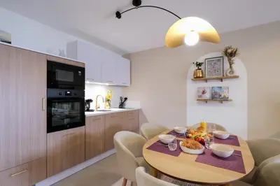 Cuisine ou kitchenette dans l'établissement Reflet d'ô Retz - Plage Montbeau - Wifi
