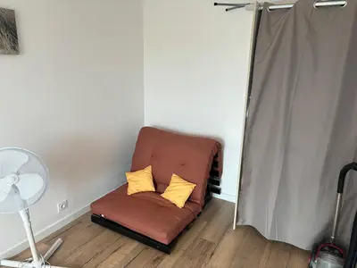Coin salon dans l'établissement Bel Appartement proche des plages et commerces