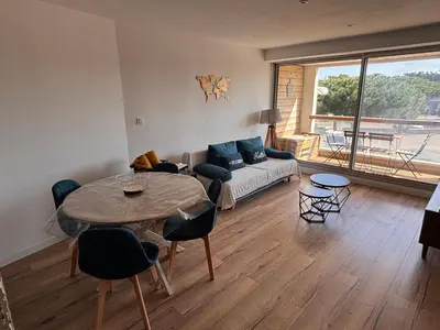 Coin salon dans l'établissement Bel Appartement proche des plages et commerces