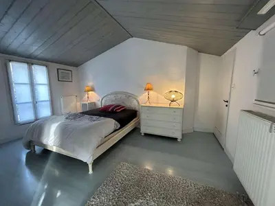 Un ou plusieurs lits dans un hébergement de l'établissement Maison de vacances 6 pers avec piscine à La Guérinière - FR-1-224B-240