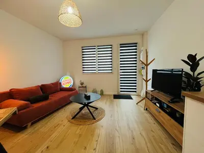 Télévision ou salle de divertissement dans l'établissement Casa Diderot - T2