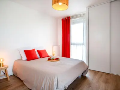 Un ou plusieurs lits dans un hébergement de l'établissement Apartment Atlantica-1 by Interhome