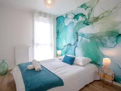 Un ou plusieurs lits dans un hébergement de l'établissement Apartment Atlantica-1 by Interhome