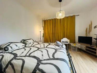 Un ou plusieurs lits dans un hébergement de l'établissement Casa Diderot - Studio