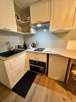 Cuisine ou kitchenette dans l'établissement Studio BROSSARD 2pers Tv and Wifi
