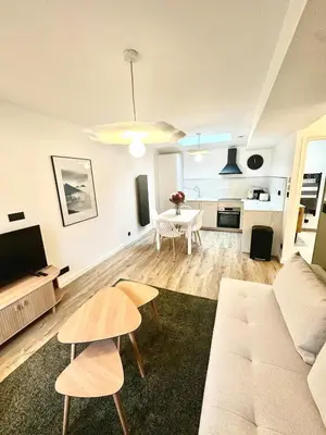 Coin salon dans l'établissement Le Cocon - Studio Chaleureux