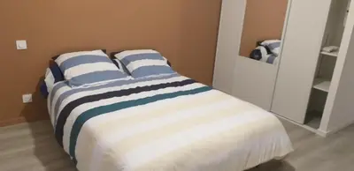 Un ou plusieurs lits dans un hébergement de l'établissement Maison Le Fenouiller Vendée 8 personnes 3 étoiles