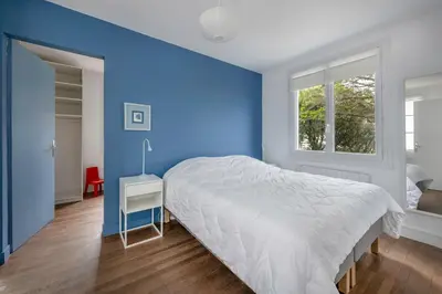 Un ou plusieurs lits dans un hébergement de l'établissement Face Mer - Plage Villa familiale pour 12