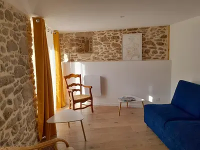 Coin salon dans l'établissement Gîte familial 8 couchages proche PuyduFou