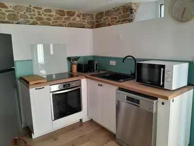 Cuisine ou kitchenette dans l'établissement Gîte familial 8 couchages proche PuyduFou